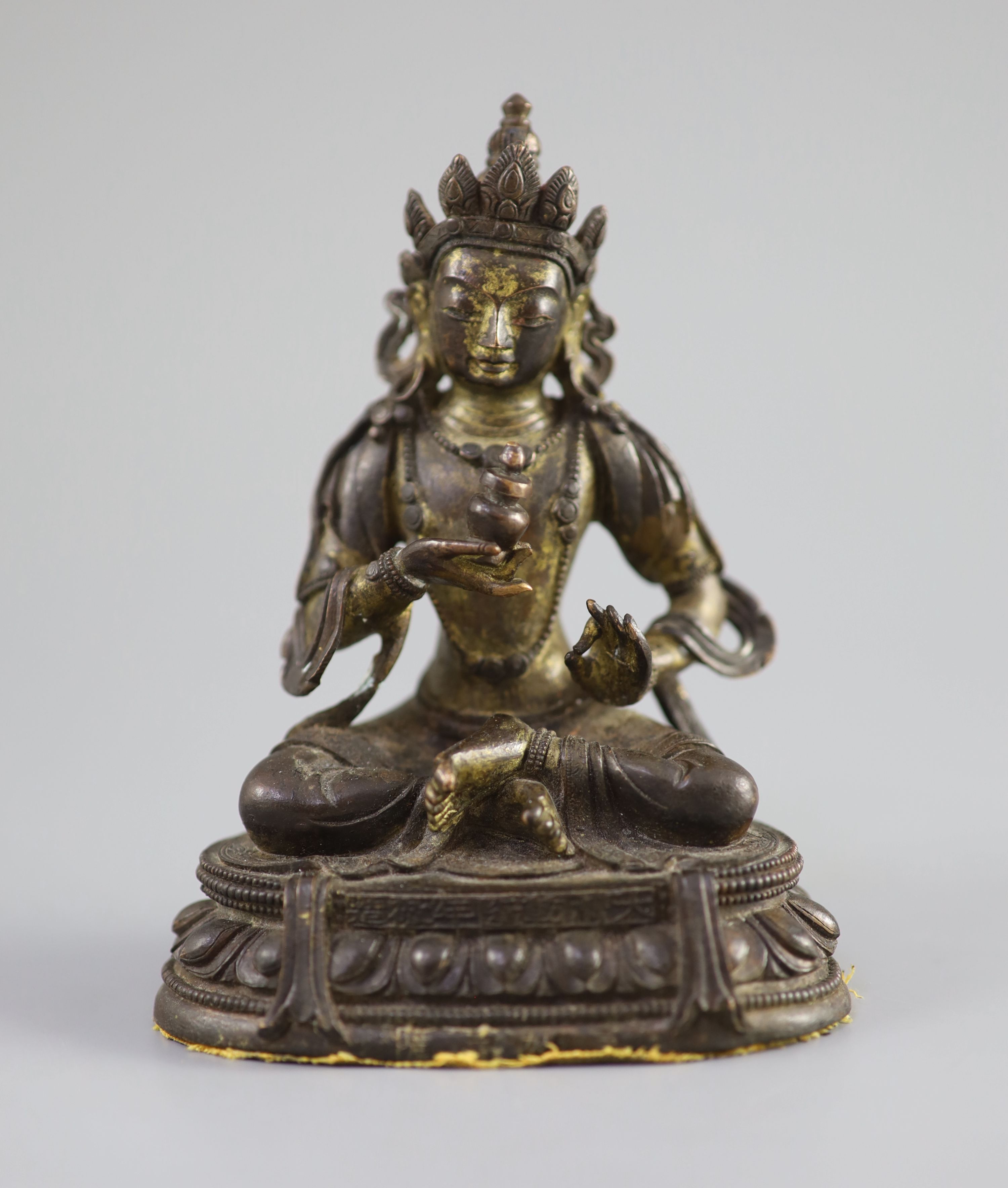 A Chinese gilt bronze figure of Amitayus, Qianlong mark and period (1736-95), 12.5 cm high